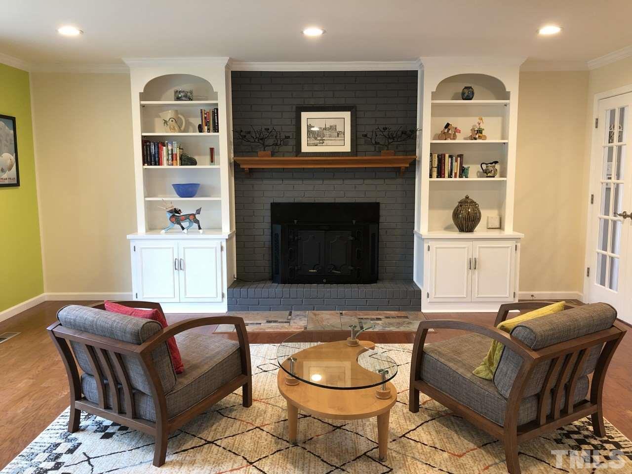 5412 Fairoaks Road Durham, NC 27712 - Photo 5 of 25 a living room with furniture and a fireplace