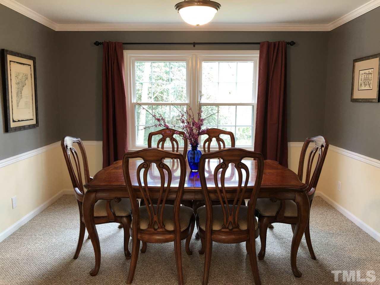 5412 Fairoaks Road Durham, NC 27712 - Photo 6 of 25 a view of a dining room with furniture window and outside view