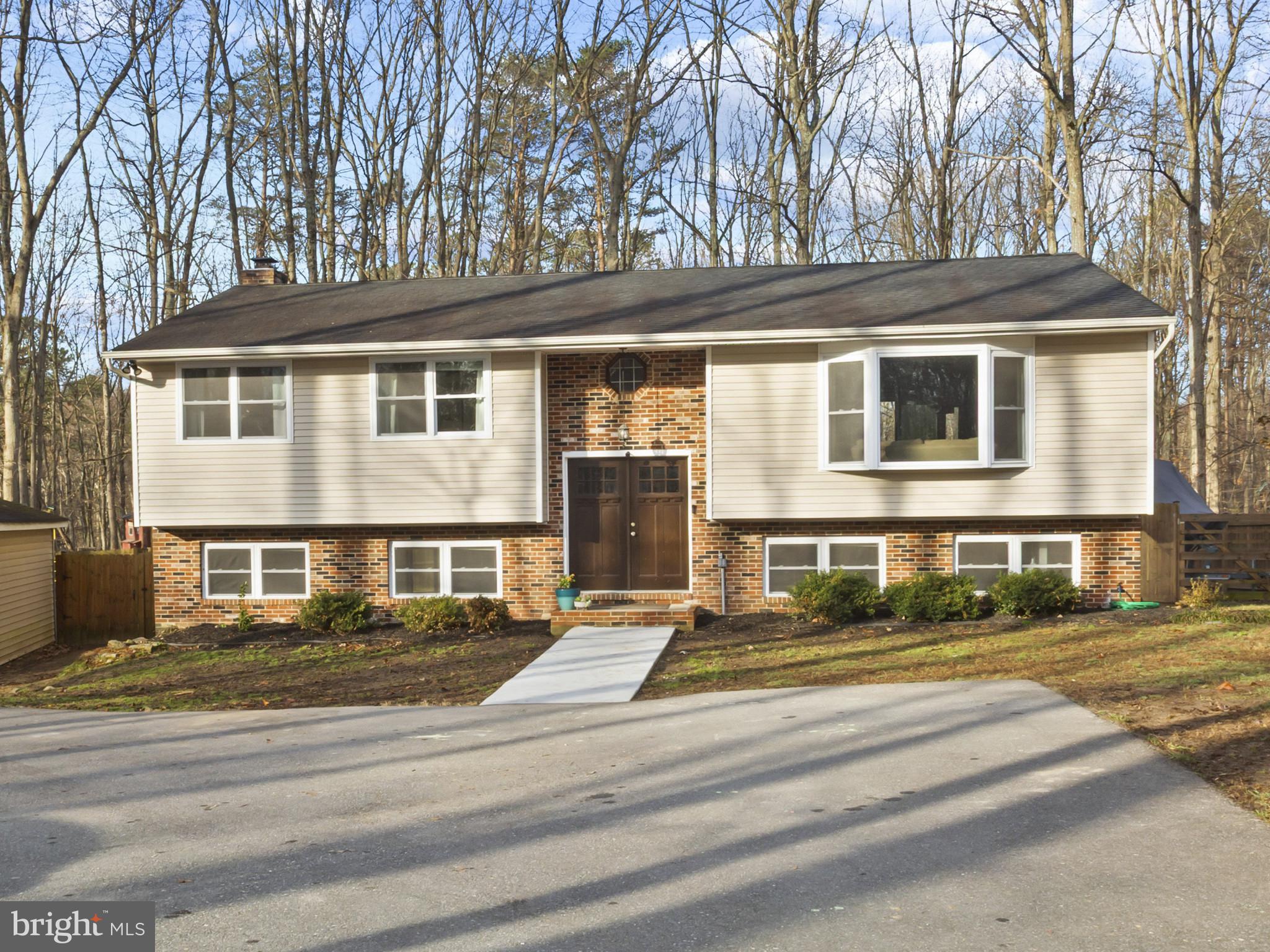 1371 Dicus Mill Road Severn, MD 21144 - Photo 1 of 35 a front view of a house