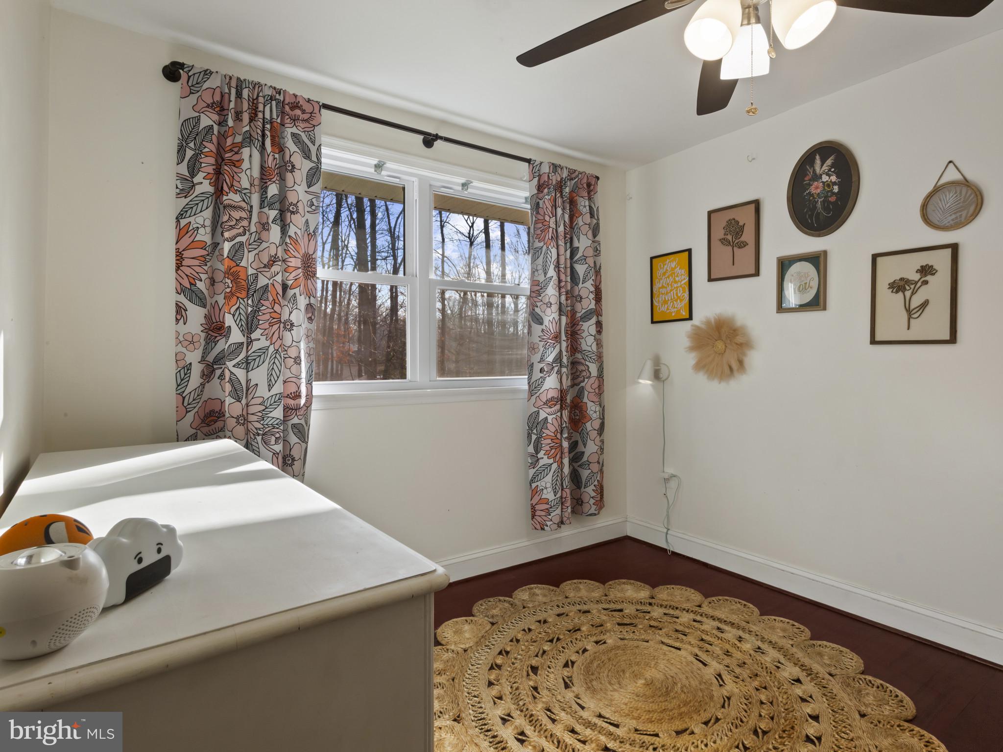 1371 Dicus Mill Road Severn, MD 21144 - Photo 17 of 35 a bathroom with a sink a mirror and shower
