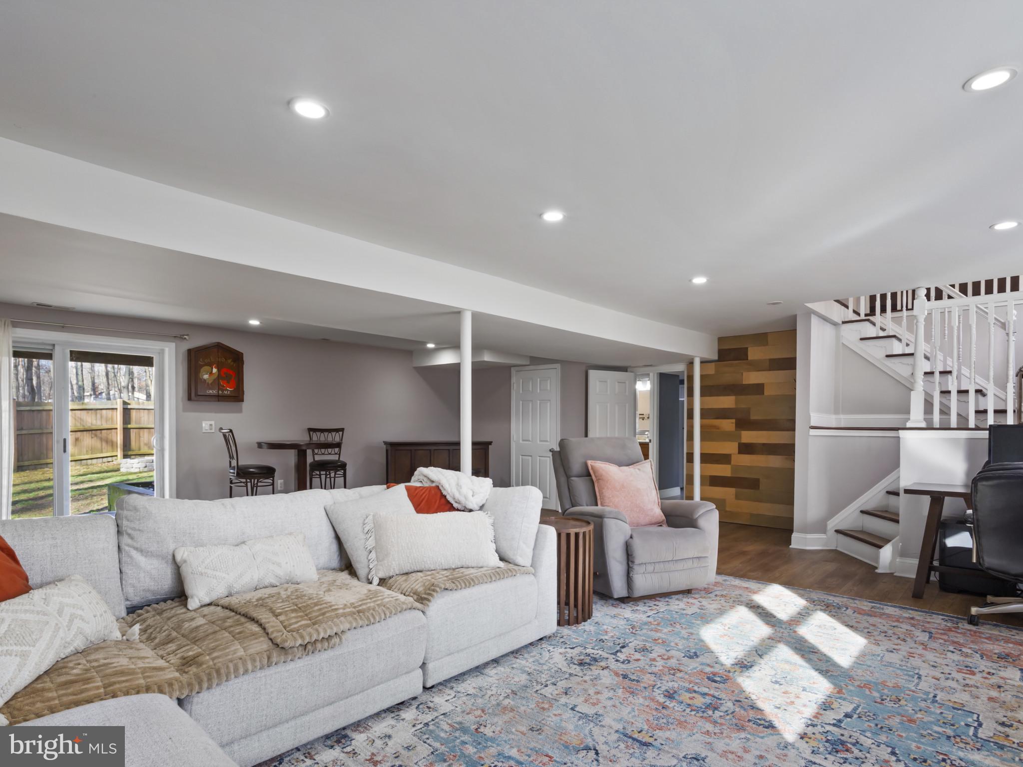 1371 Dicus Mill Road Severn, MD 21144 - Photo 22 of 35 a living room with furniture and a couch