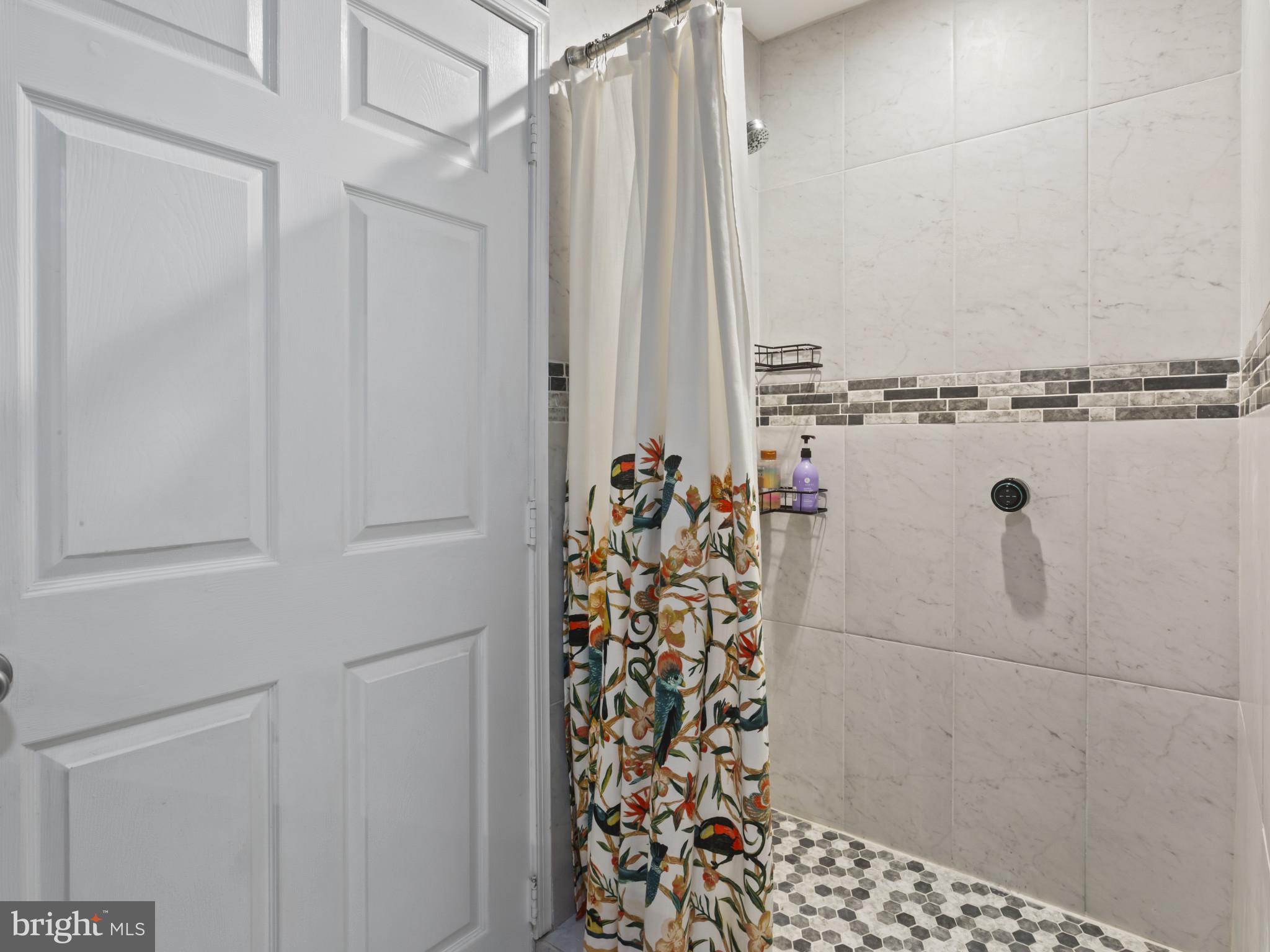 1371 Dicus Mill Road Severn, MD 21144 - Photo 29 of 35 a bathroom with a shower