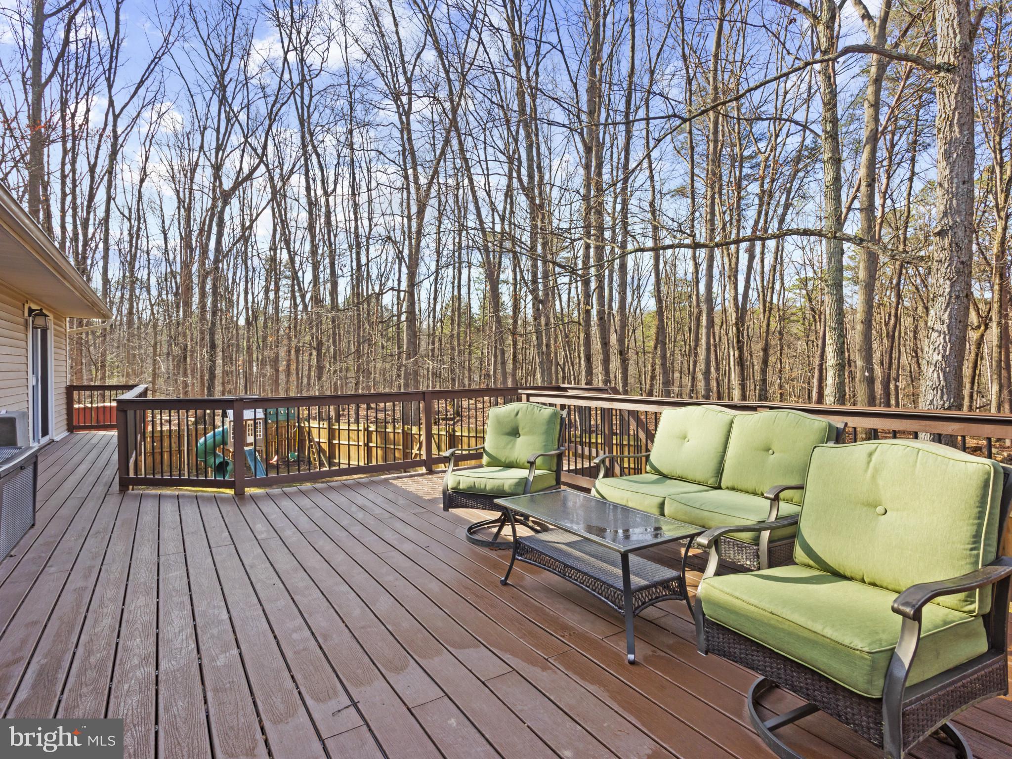 1371 Dicus Mill Road Severn, MD 21144 - Photo 32 of 35 outdoor sitting area with furniture and wooden floor