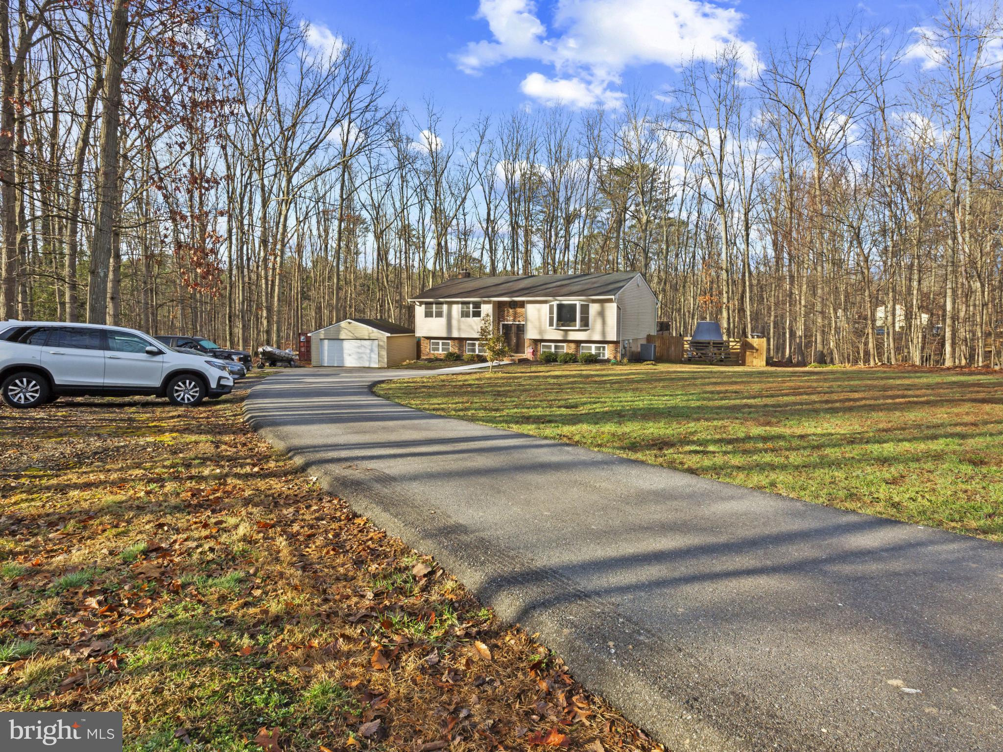 1371 Dicus Mill Road Severn, MD 21144 - Photo 4 of 35 a view of a trees in a yard