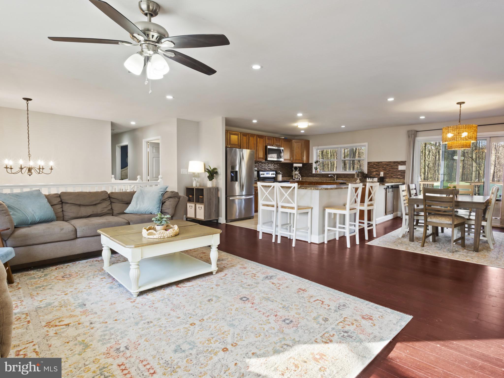 1371 Dicus Mill Road Severn, MD 21144 - Photo 7 of 35 a living room with furniture and wooden floor