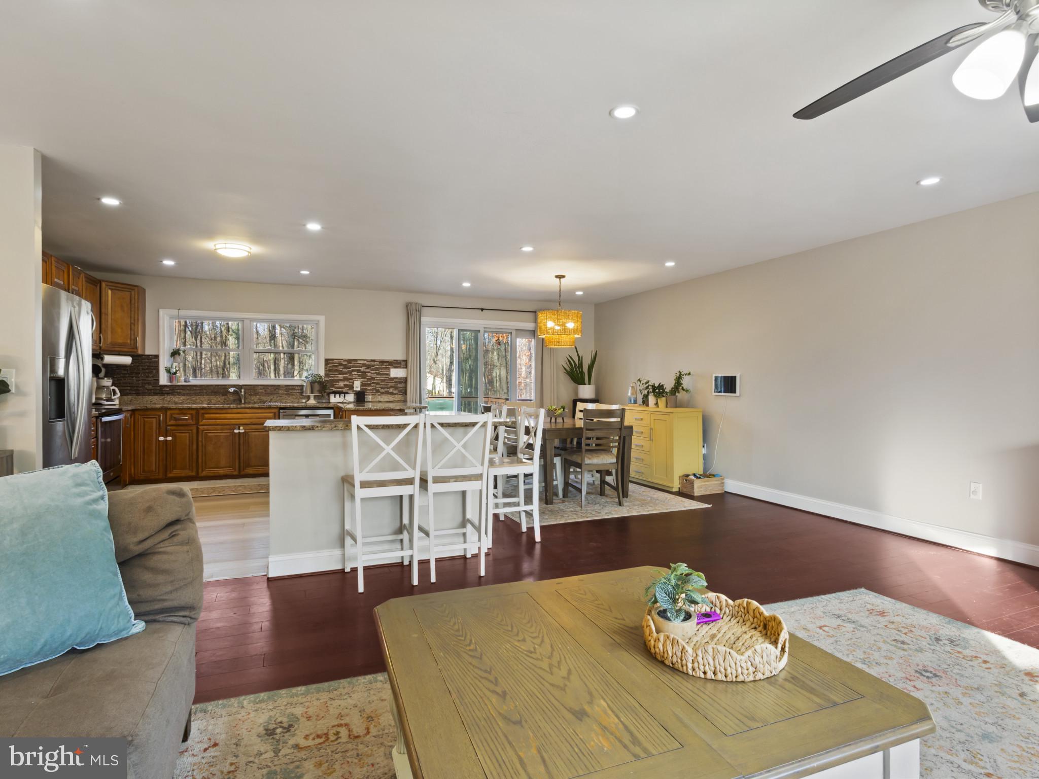 1371 Dicus Mill Road Severn, MD 21144 - Photo 8 of 35 a living room with furniture kitchen view and a table