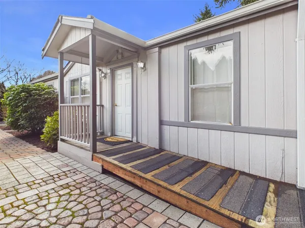 a view of backyard with cabin