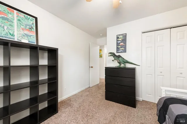 a view of bedroom with furniture and window