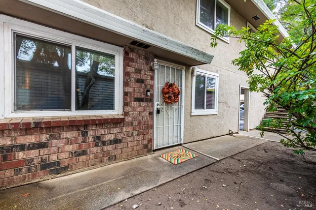 a front view of a house with a garage