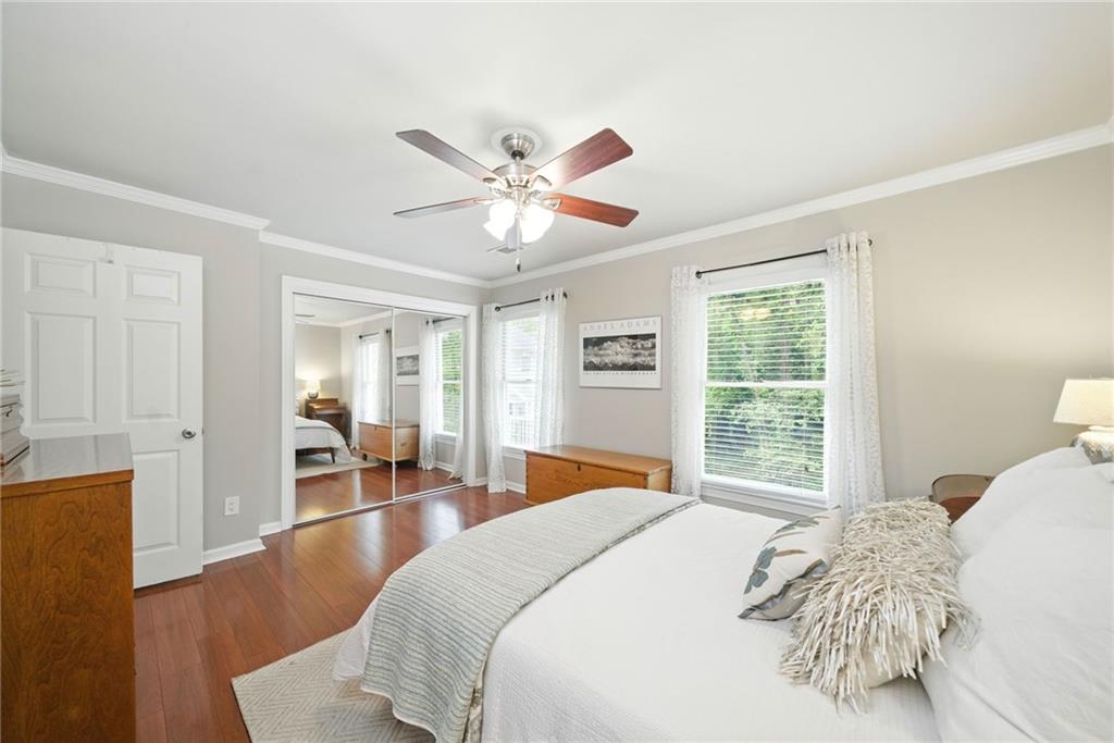 44 Mt Vernon Circle Sandy Springs, GA 30338 - Photo 14 of 27 a bedroom with a large bed and a large window
