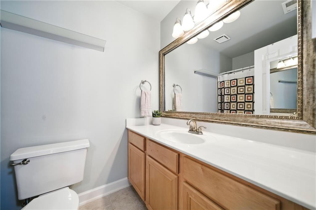 44 Mt Vernon Circle Sandy Springs, GA 30338 - Photo 17 of 27 a bathroom with a sink and a toilet