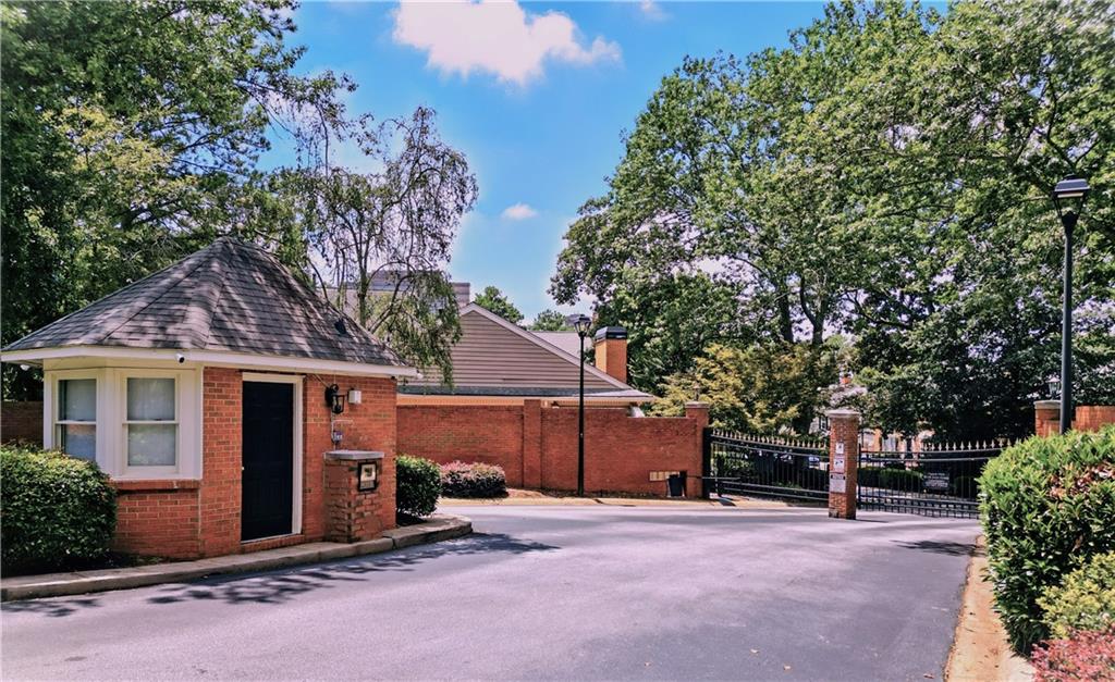 44 Mt Vernon Circle Sandy Springs, GA 30338 - Photo 2 of 27 a house with trees in front of it