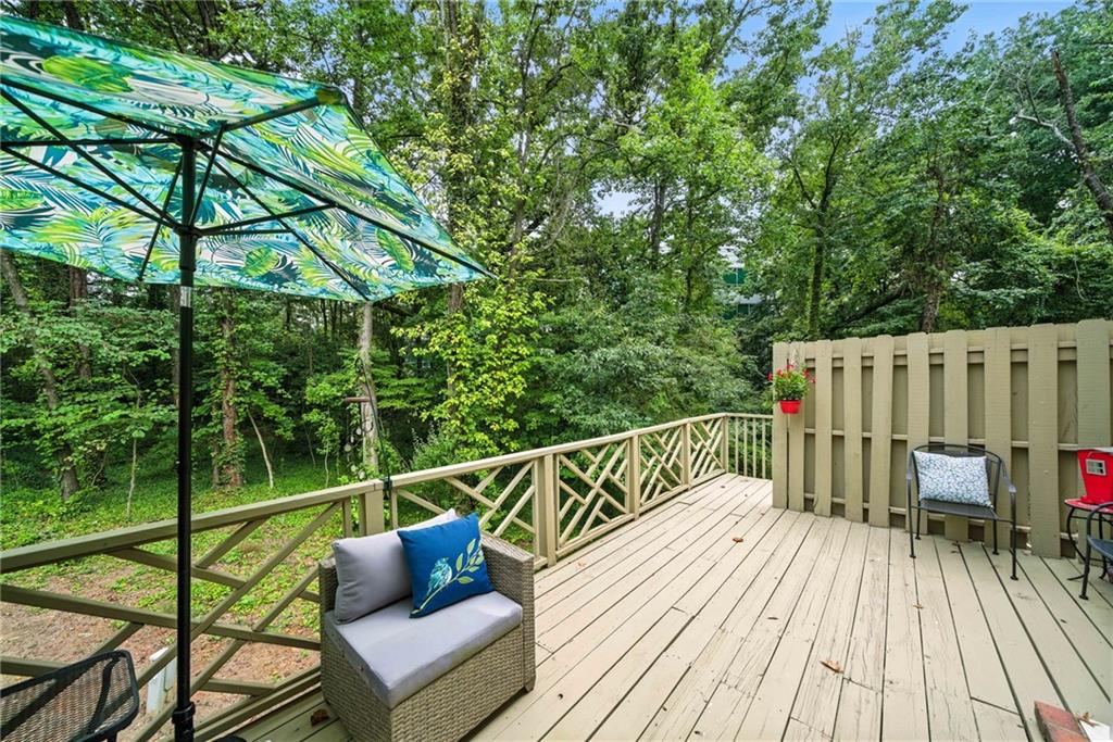 44 Mt Vernon Circle Sandy Springs, GA 30338 - Photo 22 of 27 a view of a wooden deck with furniture