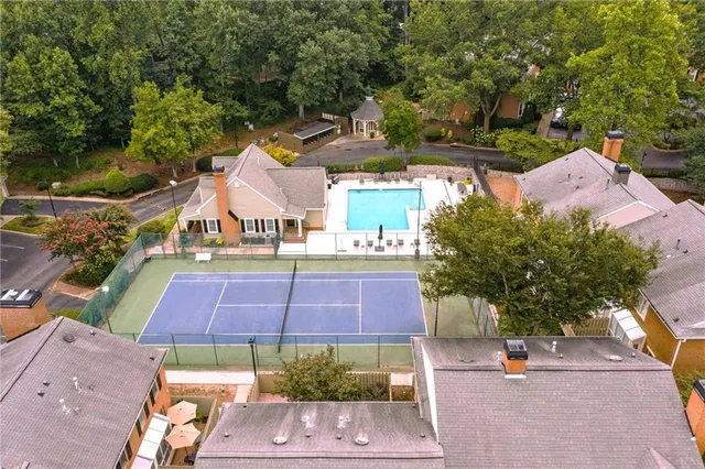 an outdoor space with lots of trees