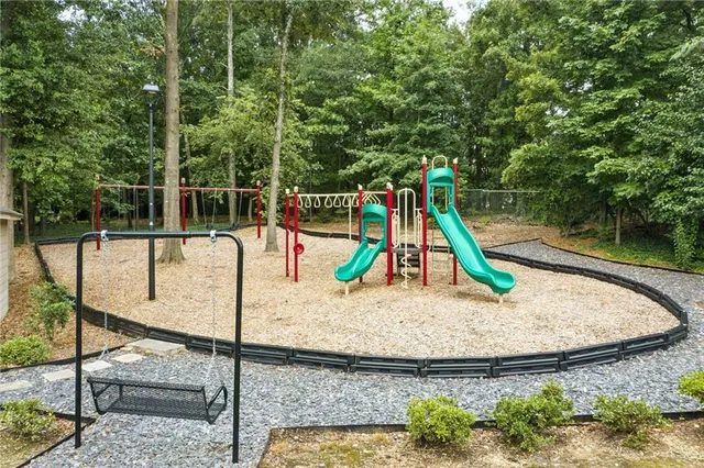 a view of a park with swings