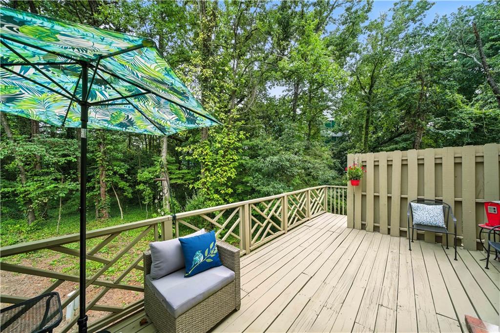 44 Mt Vernon Circle Sandy Springs, GA 30338 - Photo 3 of 27 a view of a wooden deck with furniture