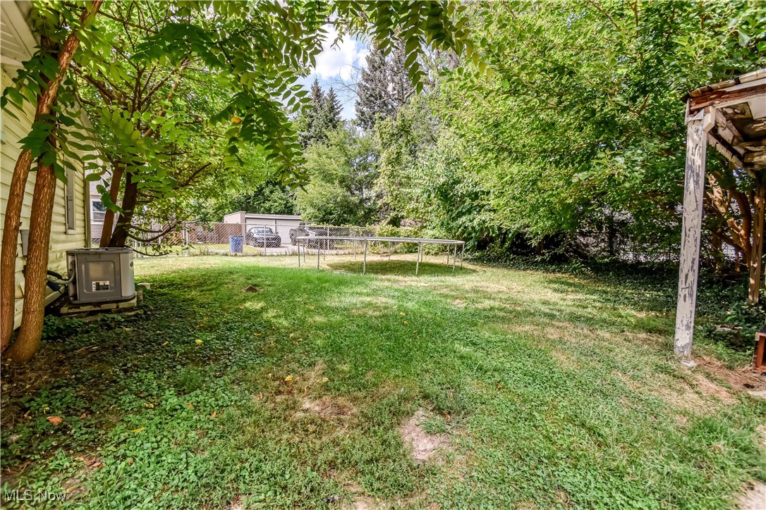 7665 Miami Road Mentor, OH 44060 - Photo 19 of 20 View of yard featuring view of wooded area