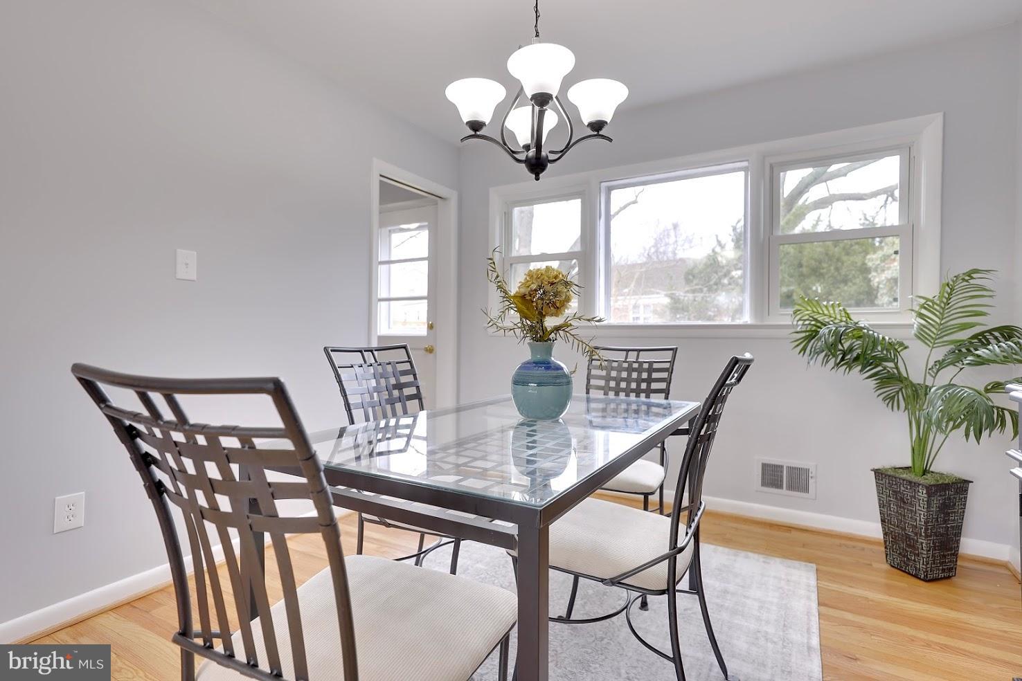 9603 Flower Avenue Silver Spring, MD 20901 - Photo 7 of 30 DINING ROOM with three windows
