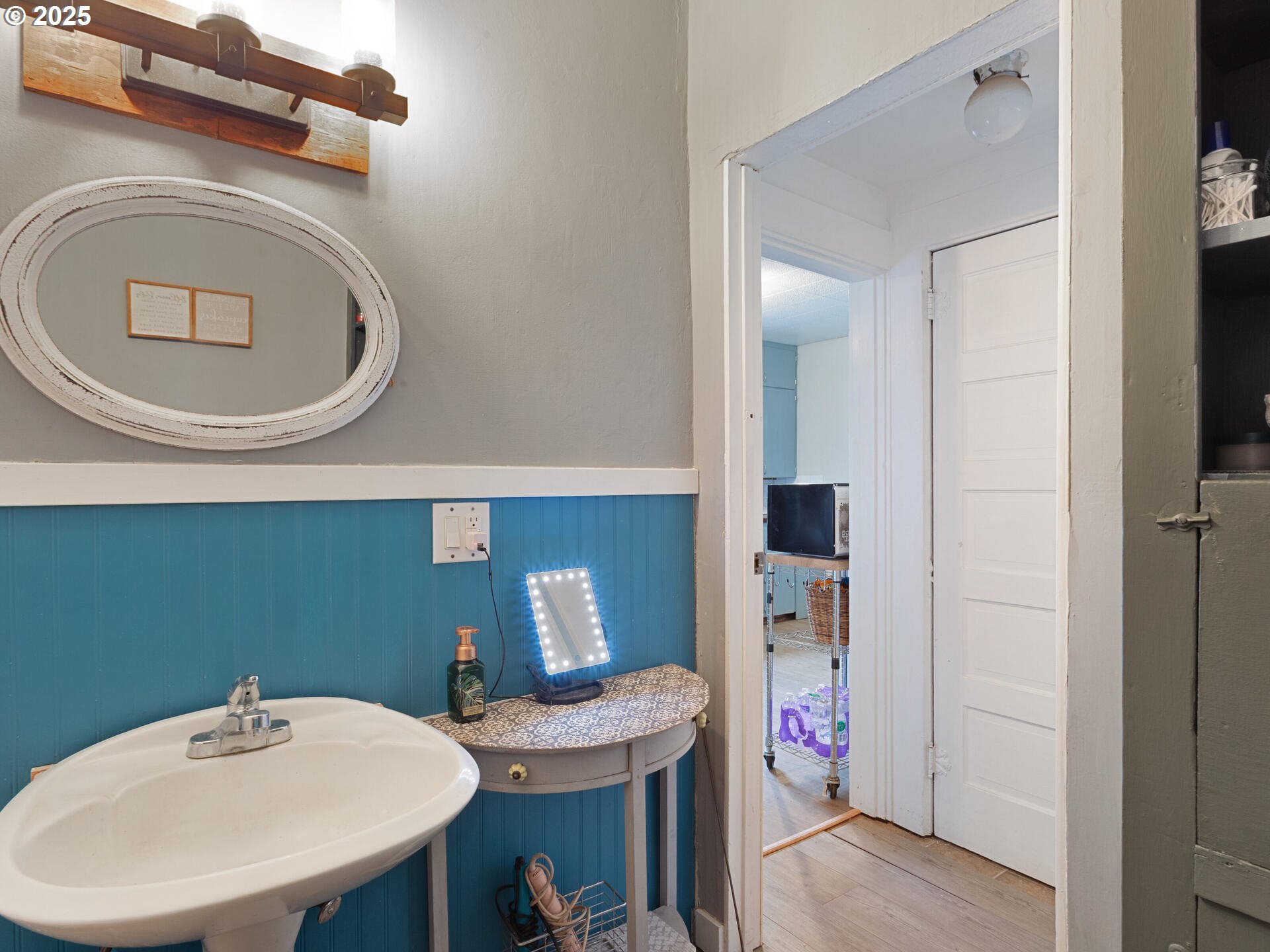 933 North Main Avenue Ridgefield, WA 98642 - Photo 19 of 42 a bathroom with a sink a toilet and a mirror