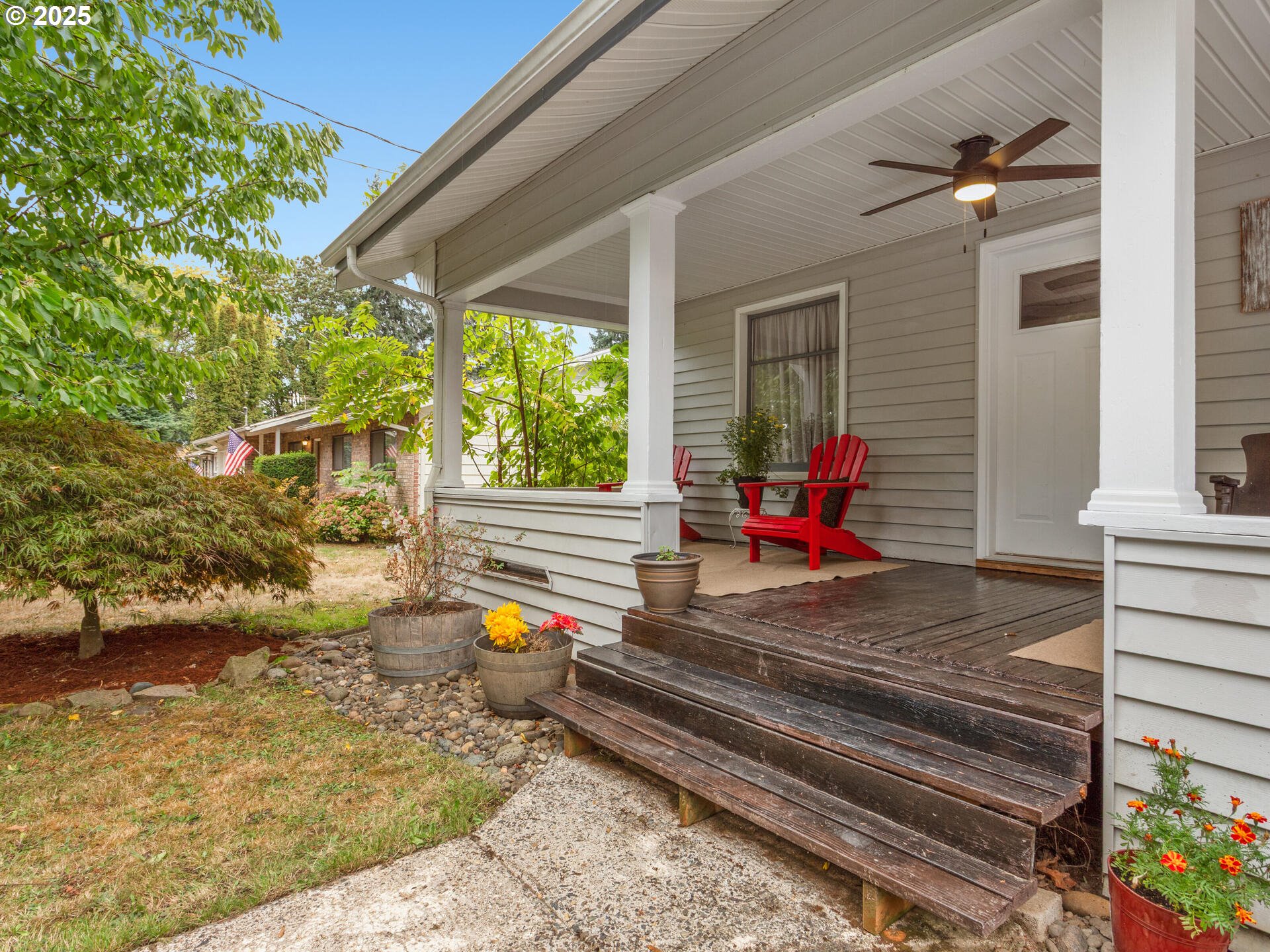 933 North Main Avenue Ridgefield, WA 98642 - Photo 3 of 42 a view of a two chair and table in the balcony