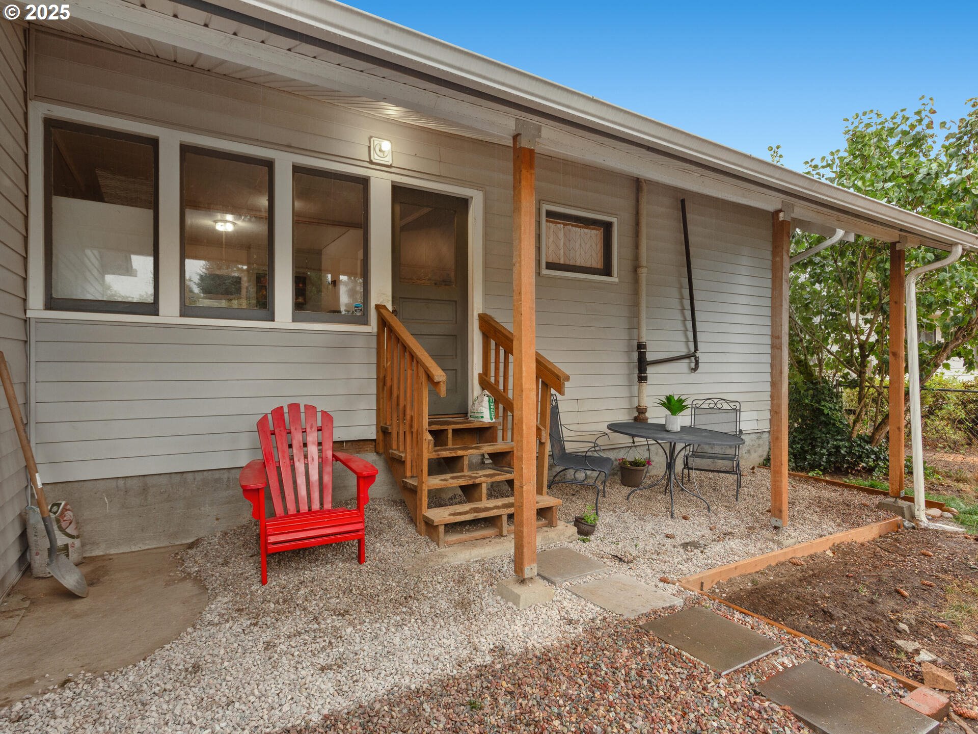 933 North Main Avenue Ridgefield, WA 98642 - Photo 39 of 42 a backyard of a house with barbeque oven table and chairs