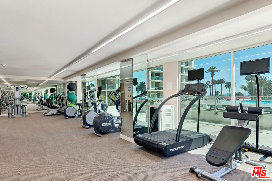 201 Ocean Avenue, Unit 1204B Santa Monica, CA 90402 - Photo 19 of 26 a view of a room with gym equipment