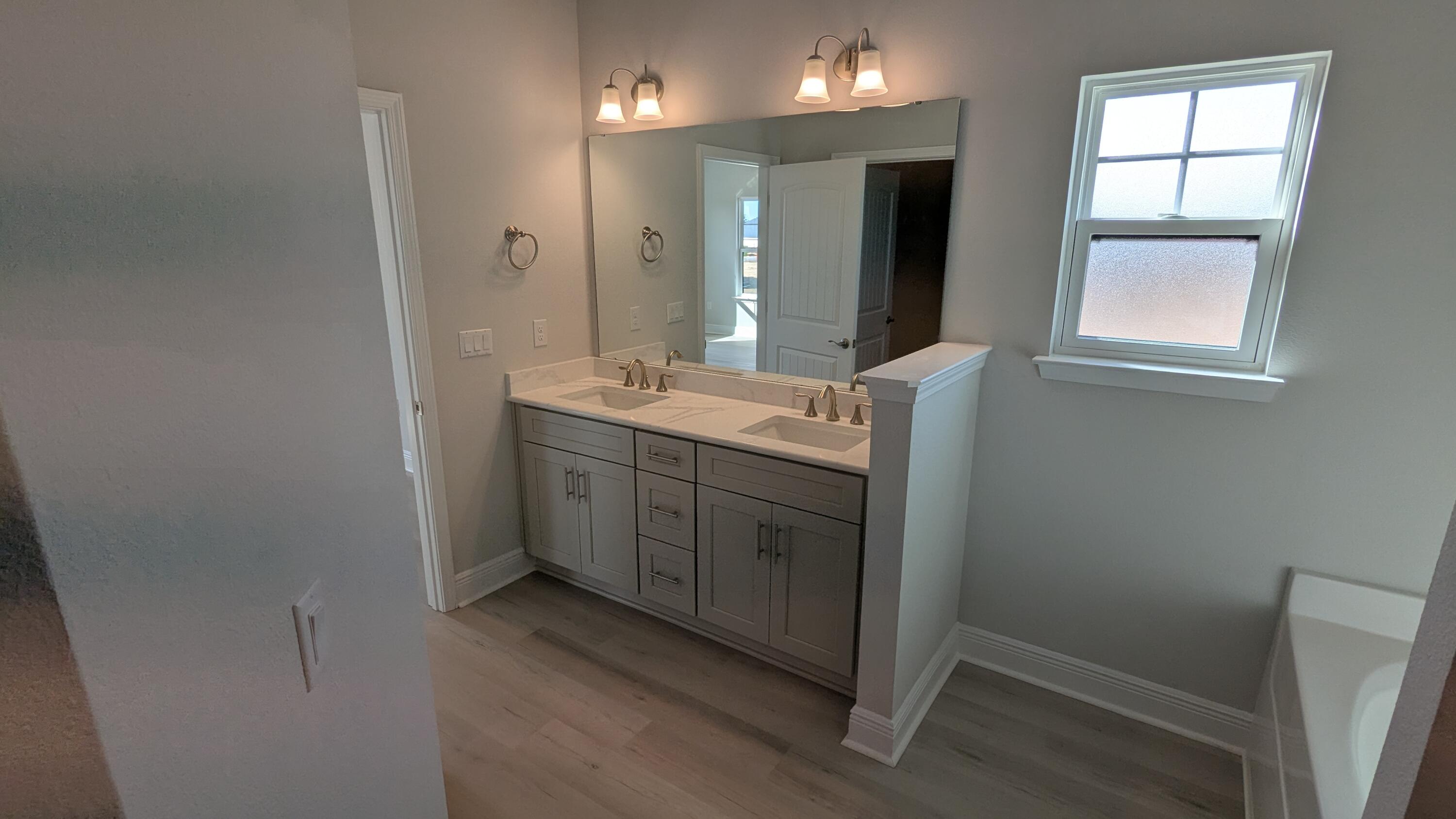 540 Alleyoak Lane, Unit LOT 462 Freeport, FL 32439 - Photo 11 of 18 Master Bath vanity