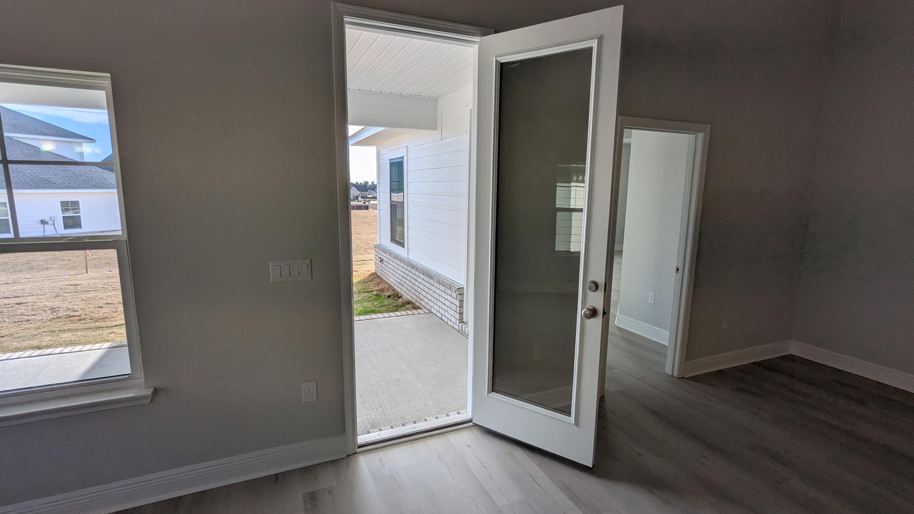 540 Alleyoak Lane, Unit LOT 462 Freeport, FL 32439 - Photo 7 of 18 Door to rear patio