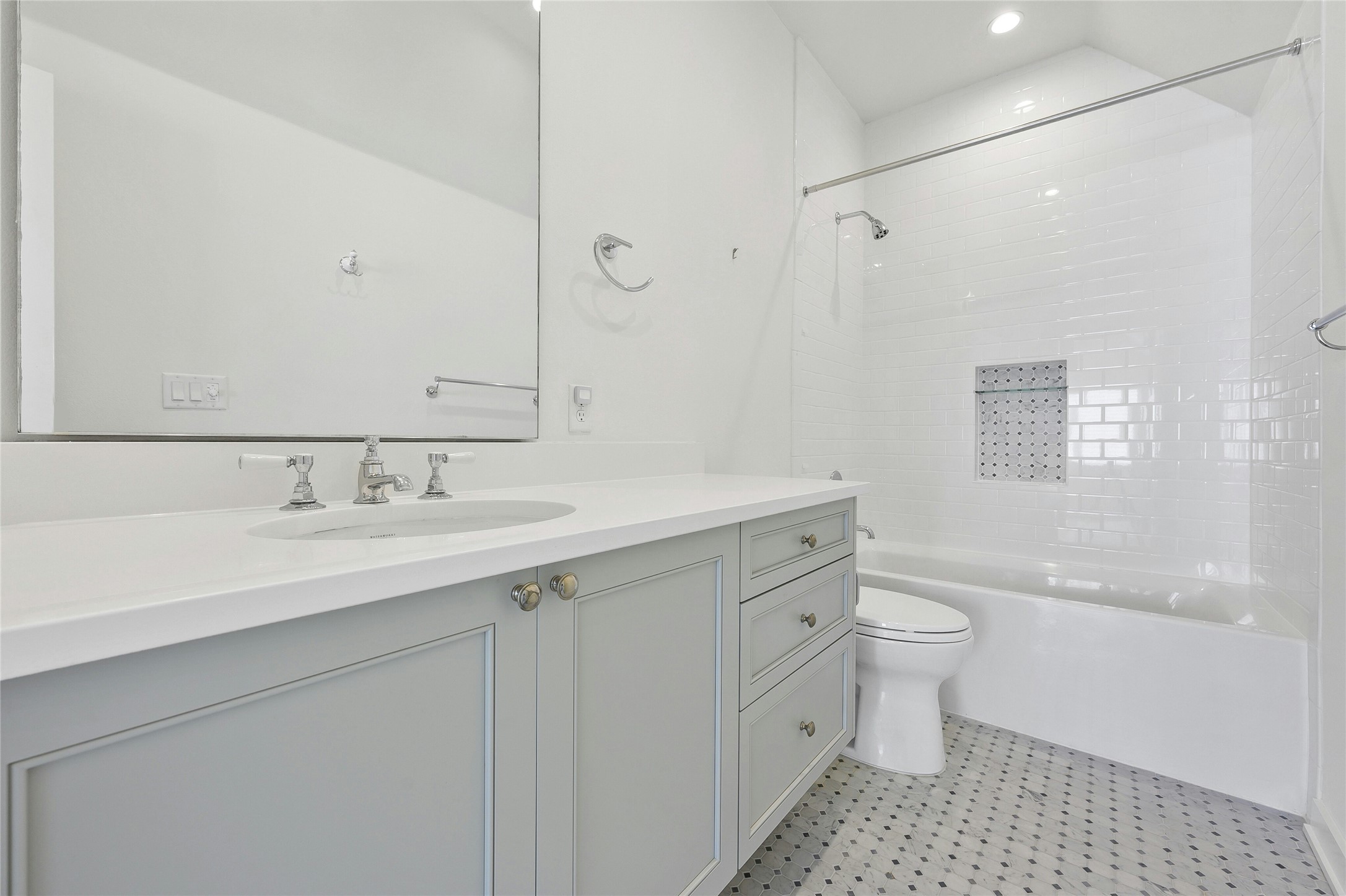 2518 Sutherland Street Austin, TX 78746 - Photo 24 of 30 Clean lines and modern fixtures define this well-appointed bathroom space.
