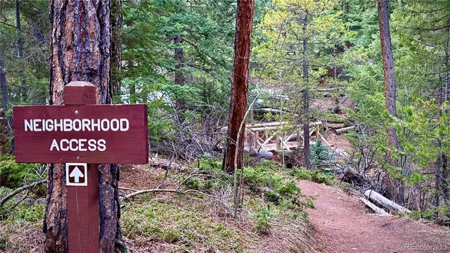 a sign that is on a brick wall