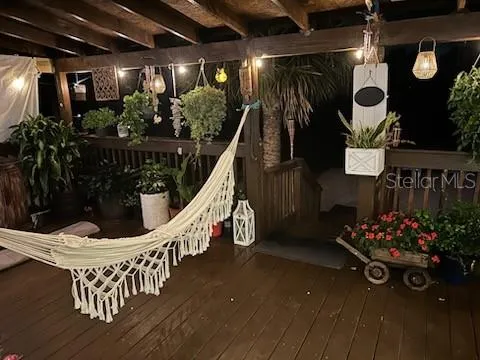 a bed room with a bed and a large mirror