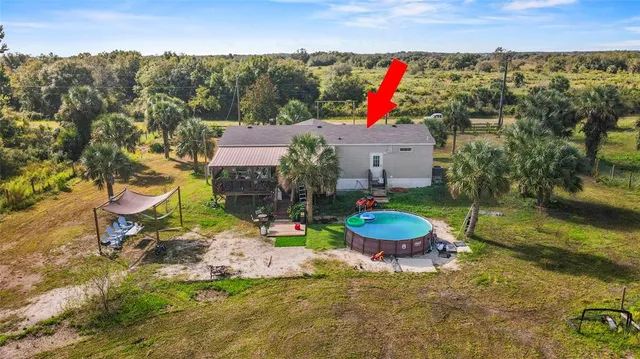a view of a outdoor sitting area with furniture