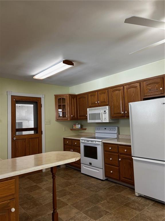 264 Douglass Road Beaver Falls, PA 15010 - Photo 16 of 35 kitchen with door leading to attached garage