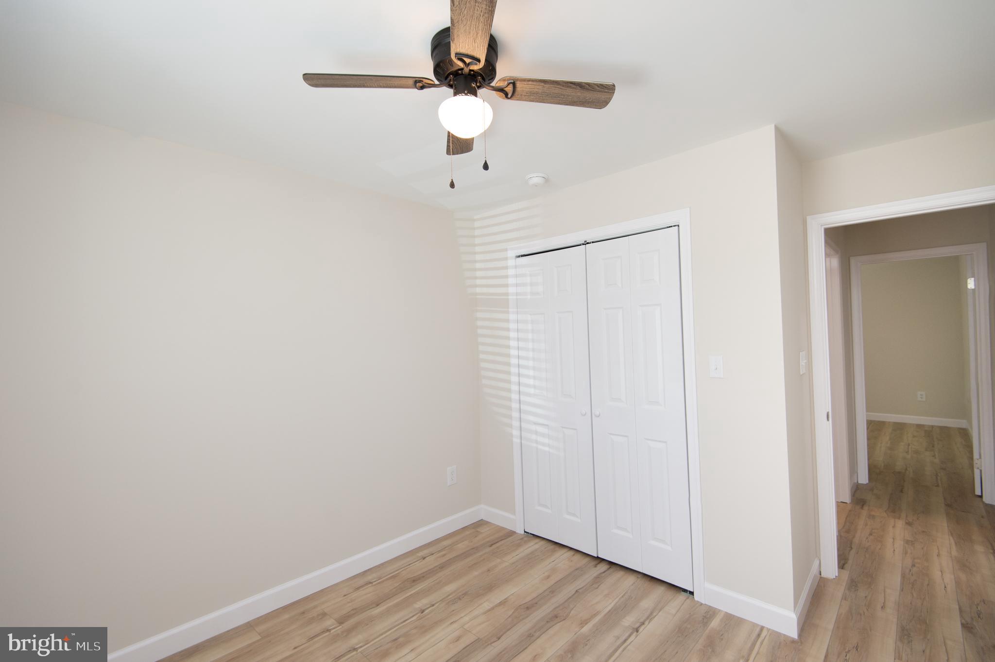 917 Springfield Avenue Cambridge, MD 21613 - Photo 18 of 42 a view of a room with wooden floor