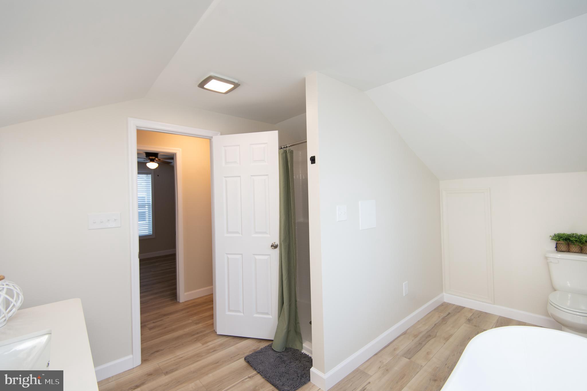 917 Springfield Avenue Cambridge, MD 21613 - Photo 29 of 42 a bathroom with a sink and a mirror