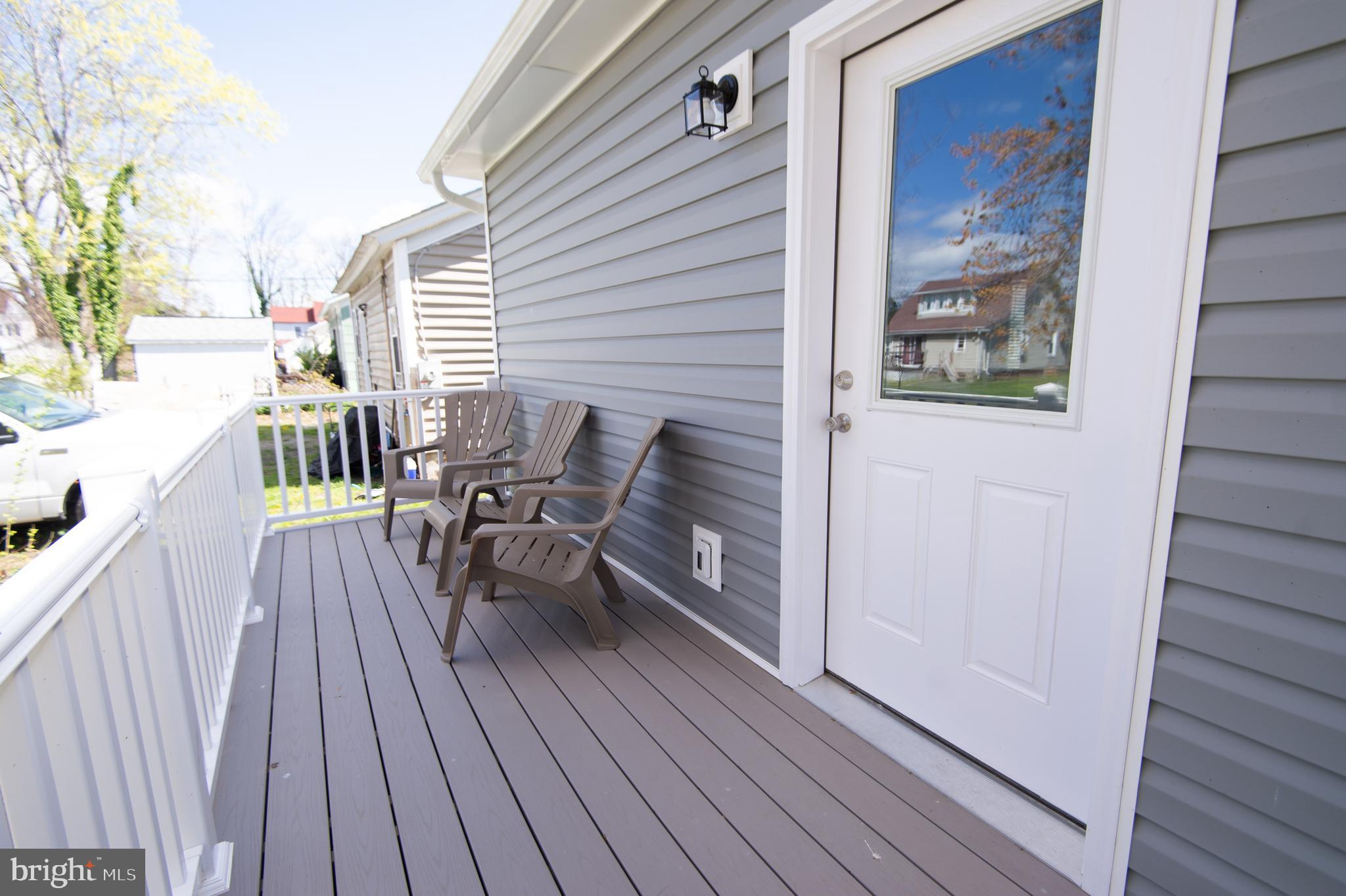 917 Springfield Avenue Cambridge, MD 21613 - Photo 38 of 42 a view of a two chairs in the balcony