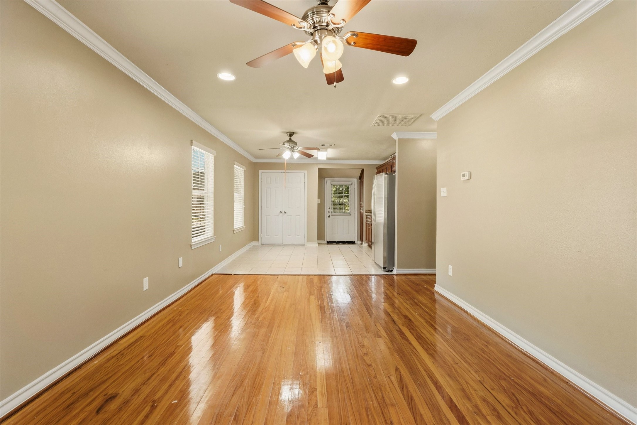 3445 Nathaniel Brown Street Houston, TX 77021 - Photo 4 of 19 a view of an empty room and wooden floor