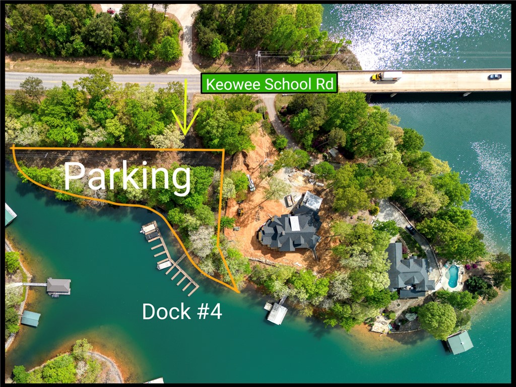 0 Ellsworth Drive Seneca, SC 29672 - Photo 7 of 7 This aerial view showcases a picturesque waterfront property with direct lake access and ample parking.