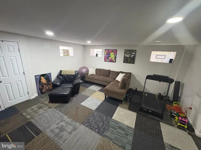 a living room with furniture and a couch