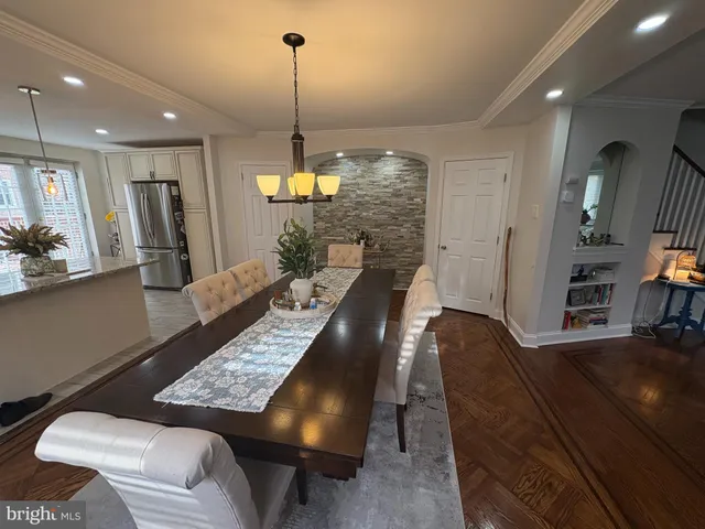 a view of a living room and dining room