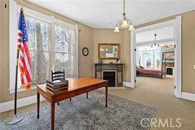 a room with furniture and a fireplace