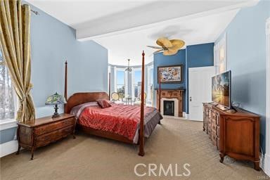 a bed room with a bed and a tv