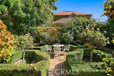 a view of a garden with patio