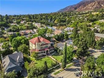 an aerial view of a house with a garden