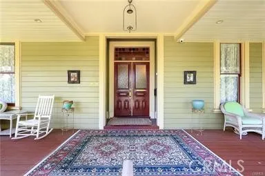 a front view of a house with many windows
