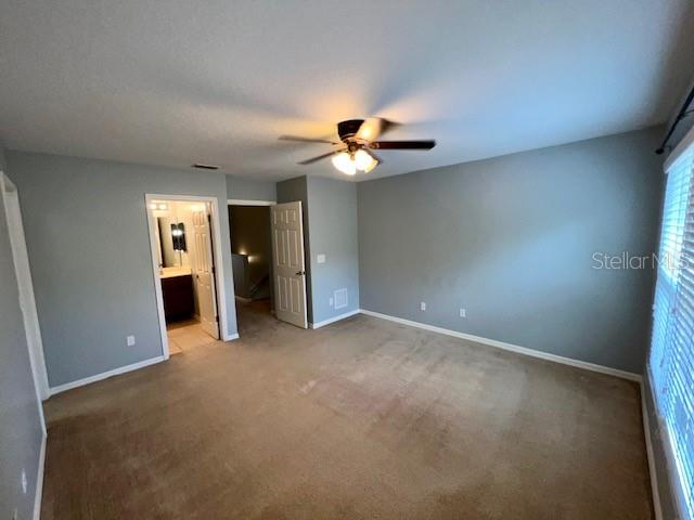 3896 Silverbell Loop Oviedo, FL 32765 - Photo 24 of 38 an empty room with closet and a chandelier fan