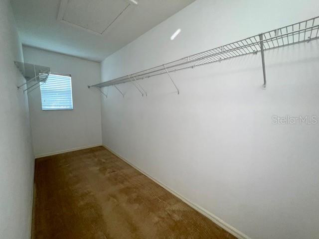 3896 Silverbell Loop Oviedo, FL 32765 - Photo 25 of 38 a view of a room with racks on the wall