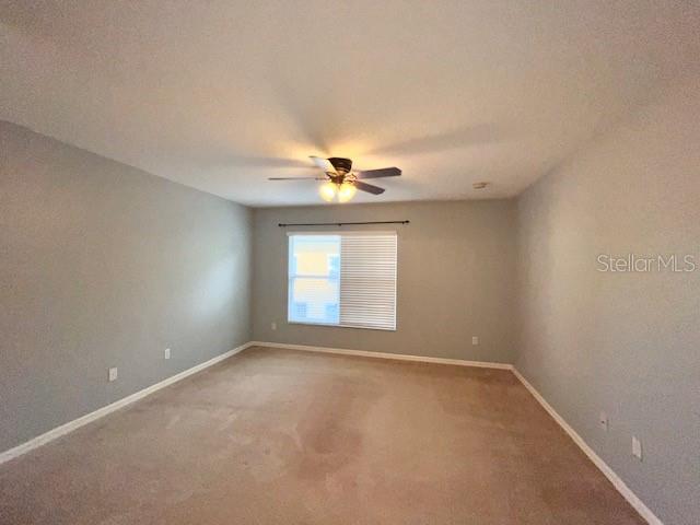 3896 Silverbell Loop Oviedo, FL 32765 - Photo 30 of 38 a view of an empty room with a window
