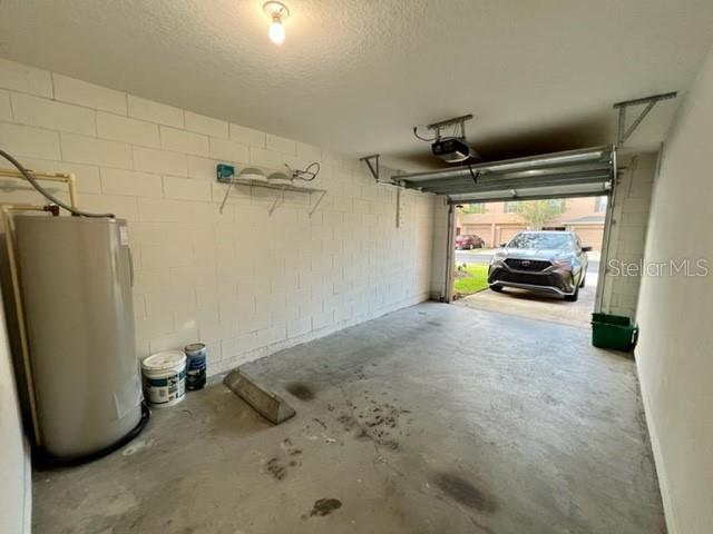 3896 Silverbell Loop Oviedo, FL 32765 - Photo 32 of 38 a view of a car garage