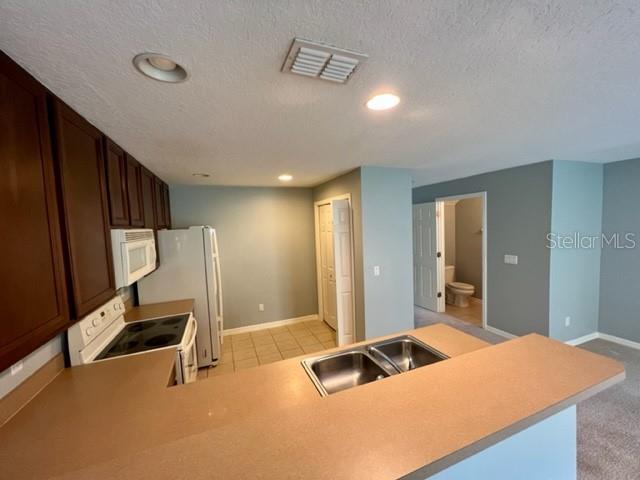 3896 Silverbell Loop Oviedo, FL 32765 - Photo 9 of 38 a bedroom with a bed and a gym equipment